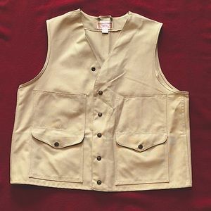 Filson size 46 Cruiser Vest. Never worn. Back pocket for jacket or rain gear.